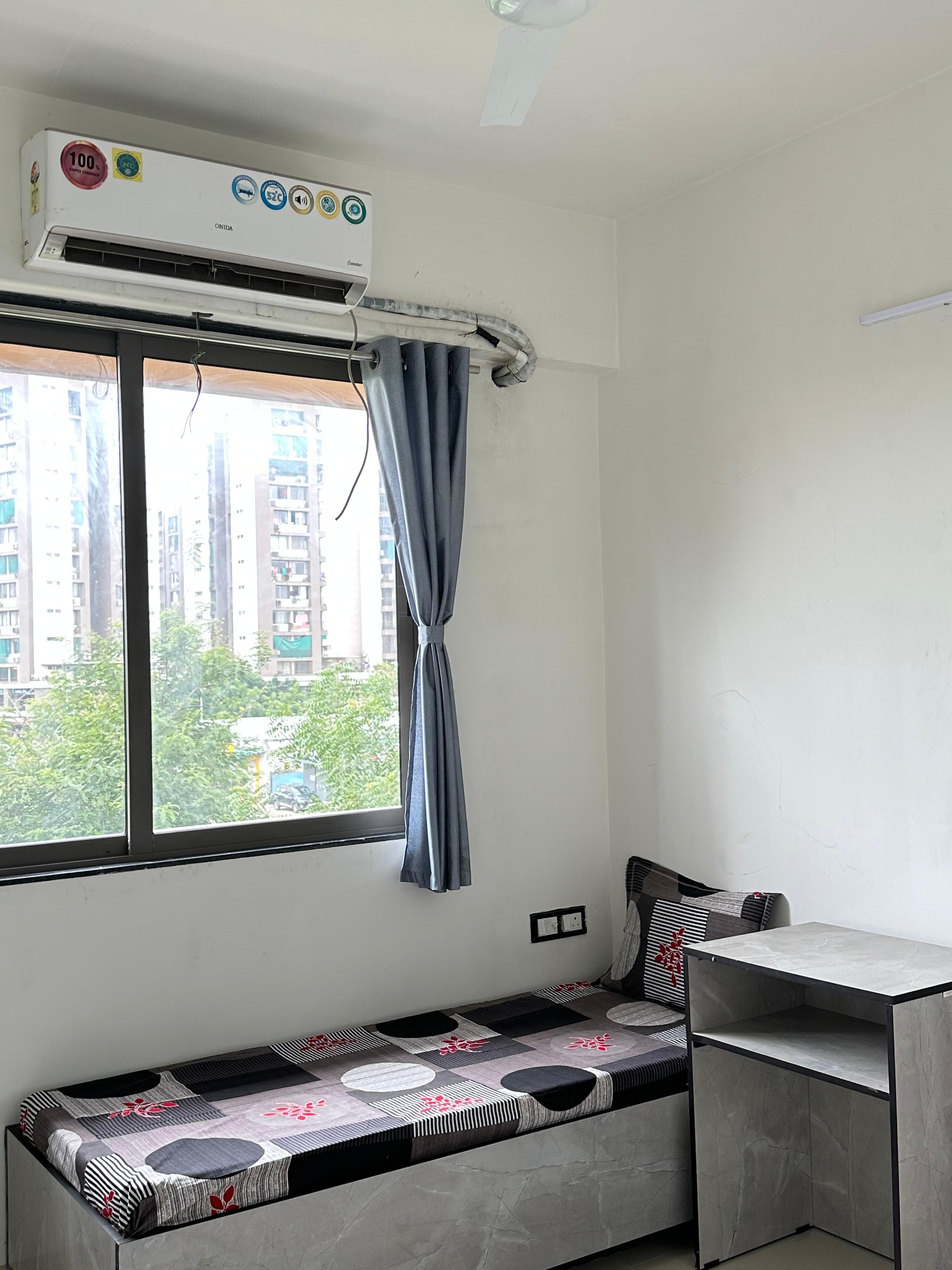 Single Room at Unoloft PG in Ahmedabad with AC and study setup