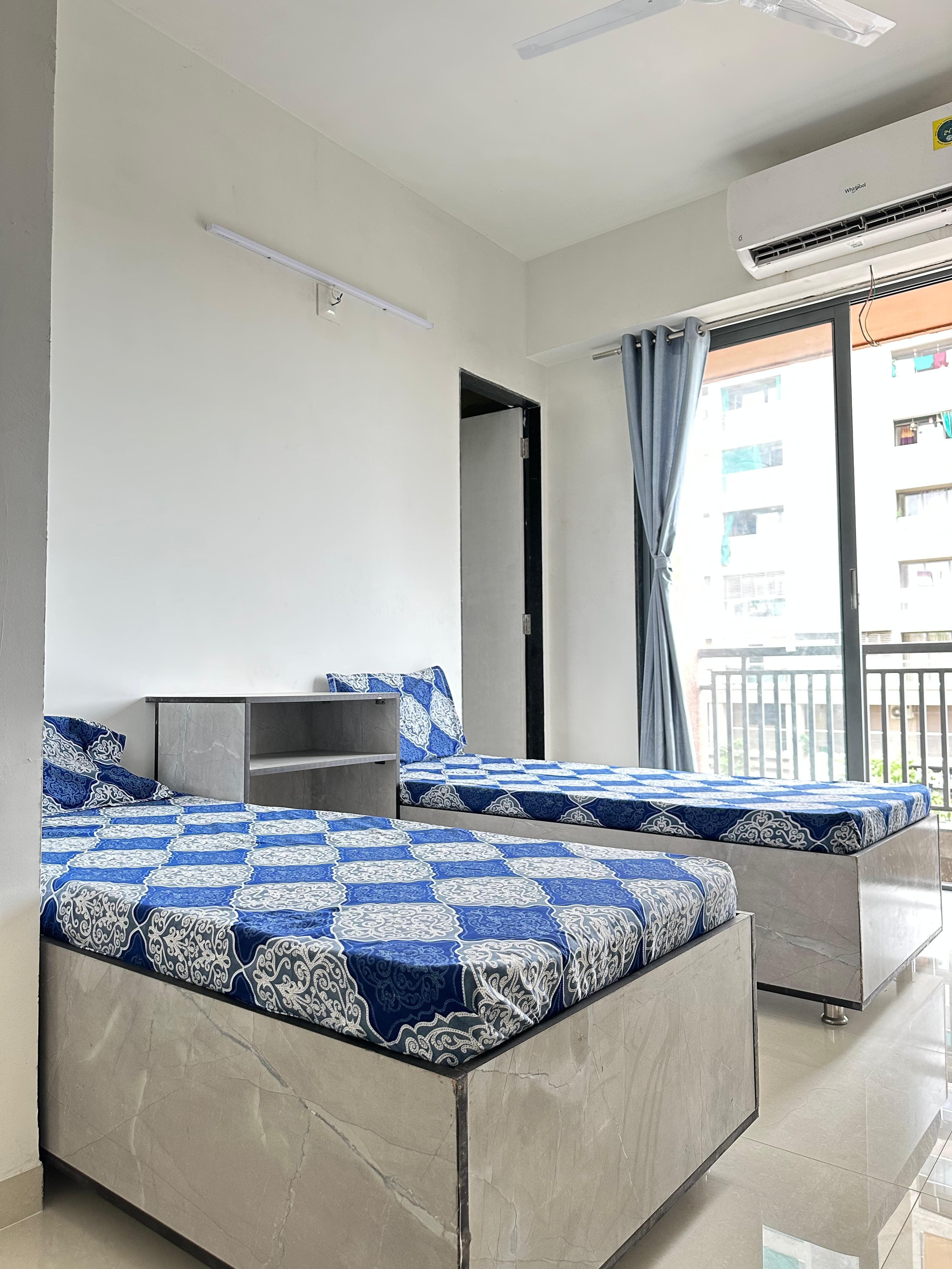 Double Room at Unoloft PG in Ahmedabad with AC and study setup