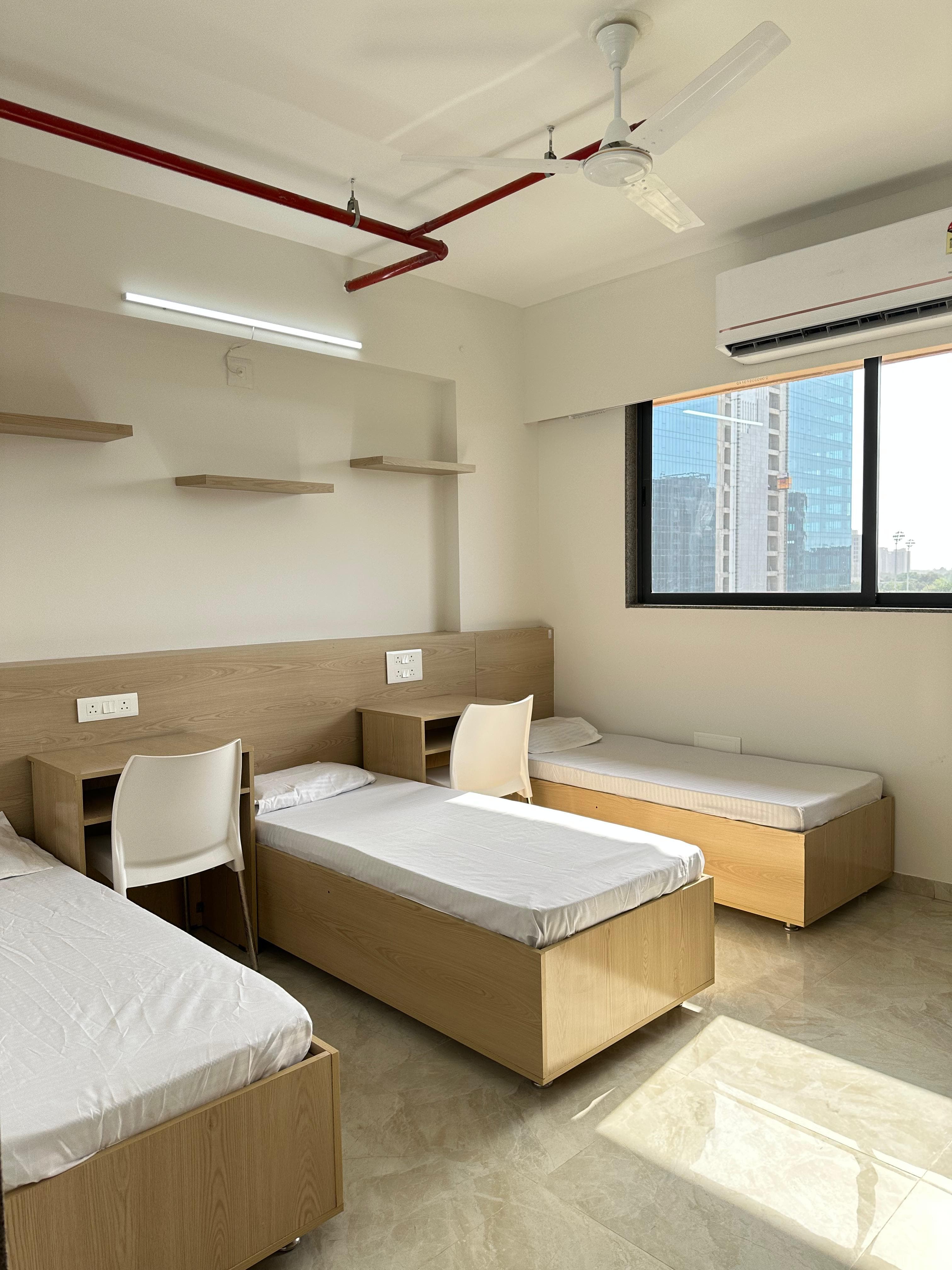 Iris Room 1 at Unoloft PG near Nirma University Ahmedabad