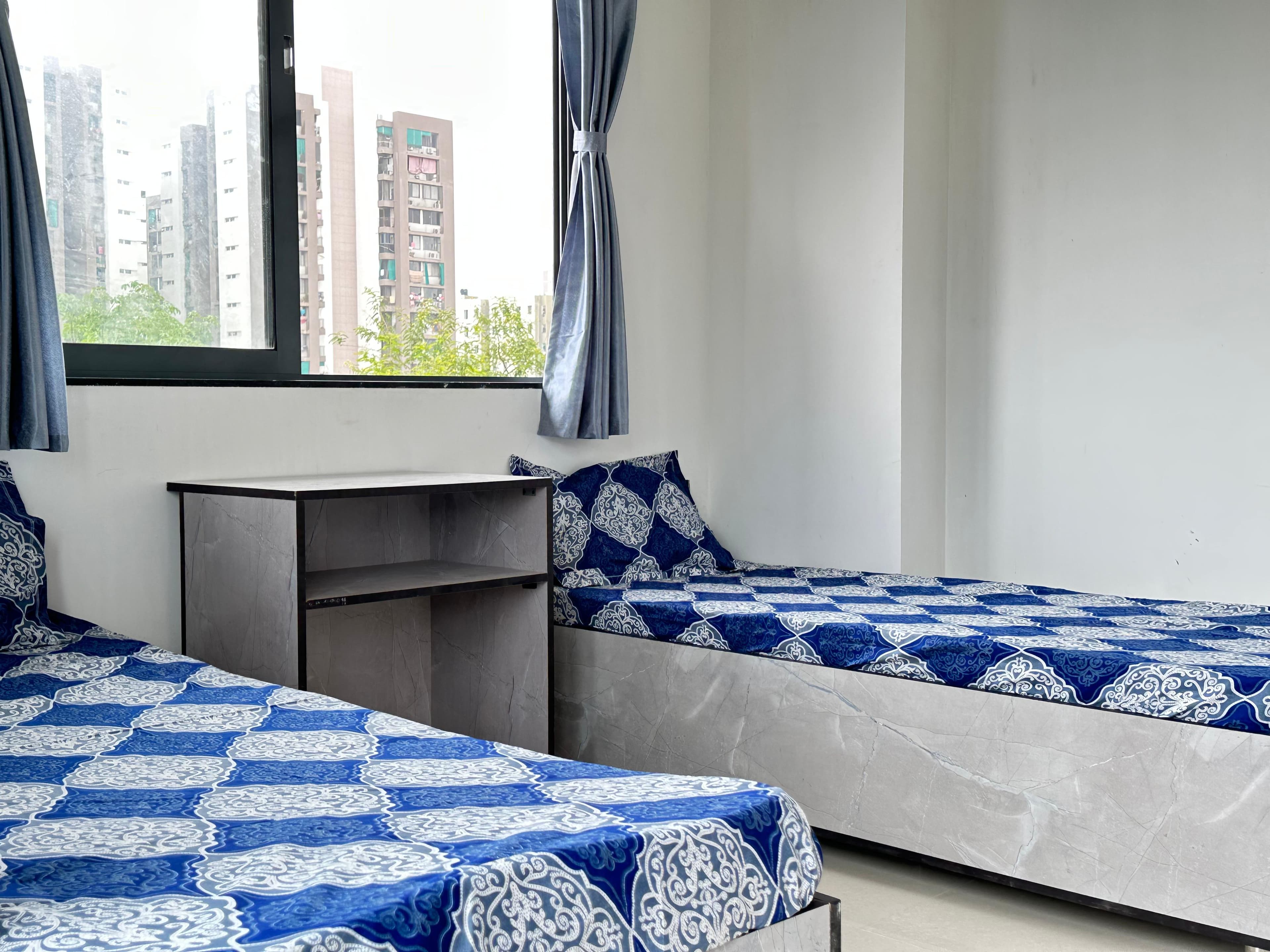 Aster Room 2 at Unoloft PG near Nirma University Ahmedabad