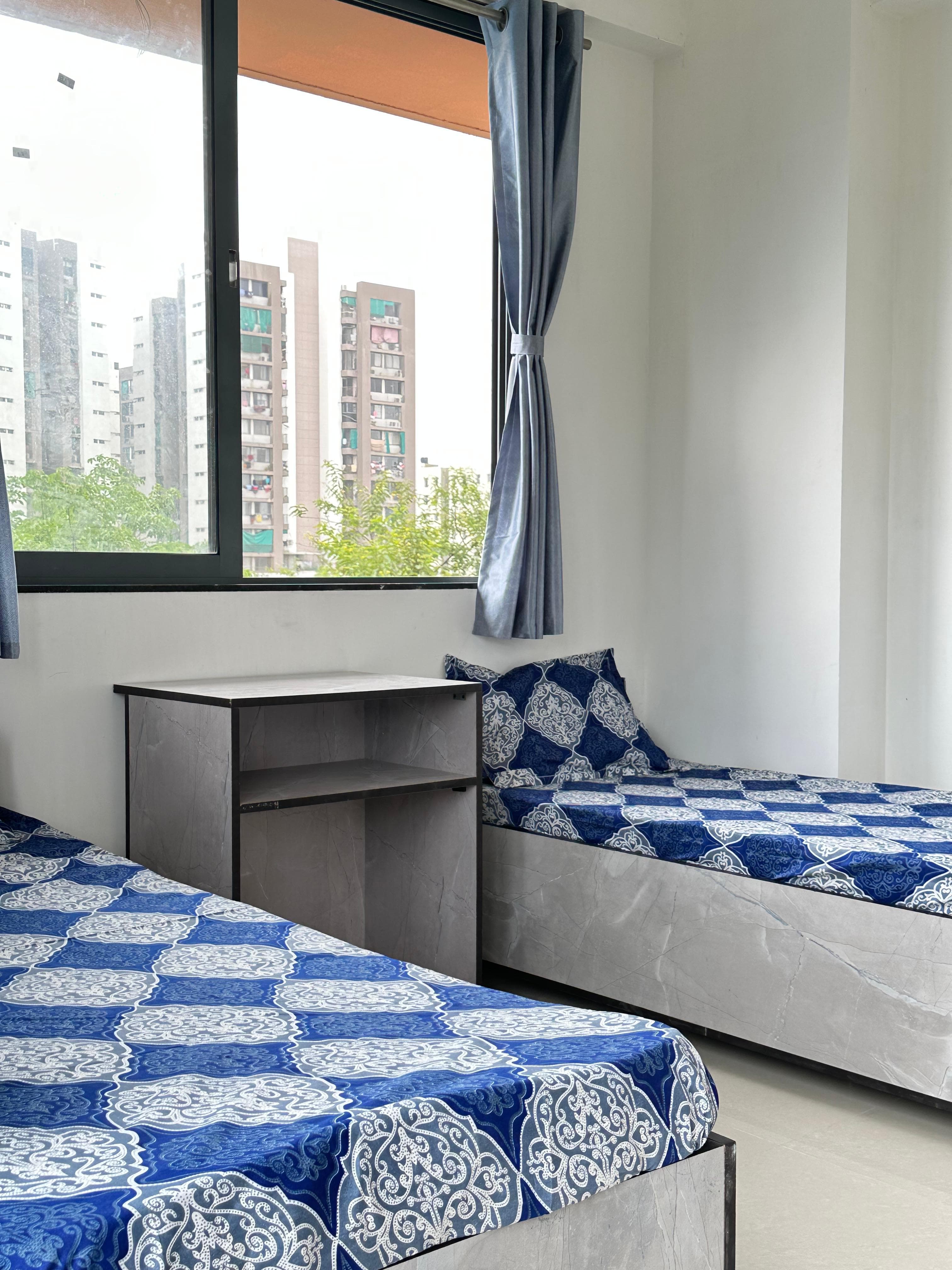 Aster Room 3 at Unoloft PG near Nirma University Ahmedabad